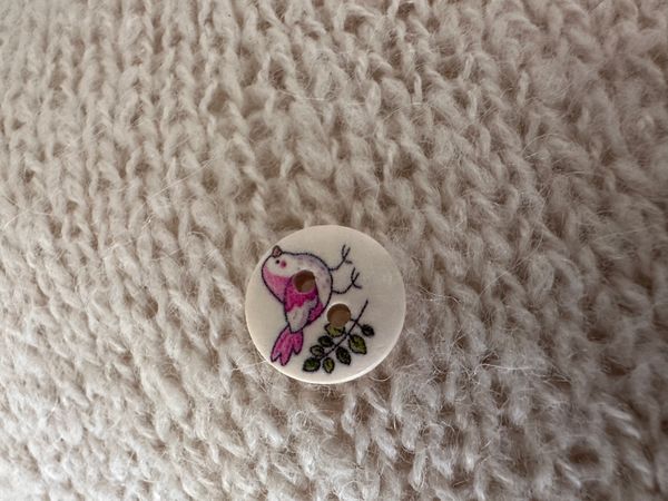 Hovedbilde Knapp tre Rosa fugl